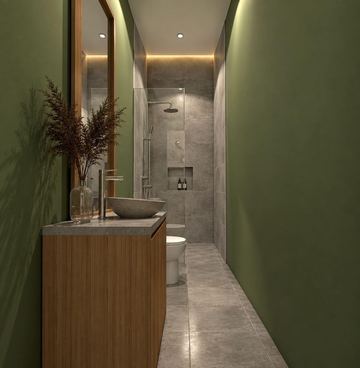 Kamar mandi sempit bernuansa hijau dengan shower kaca